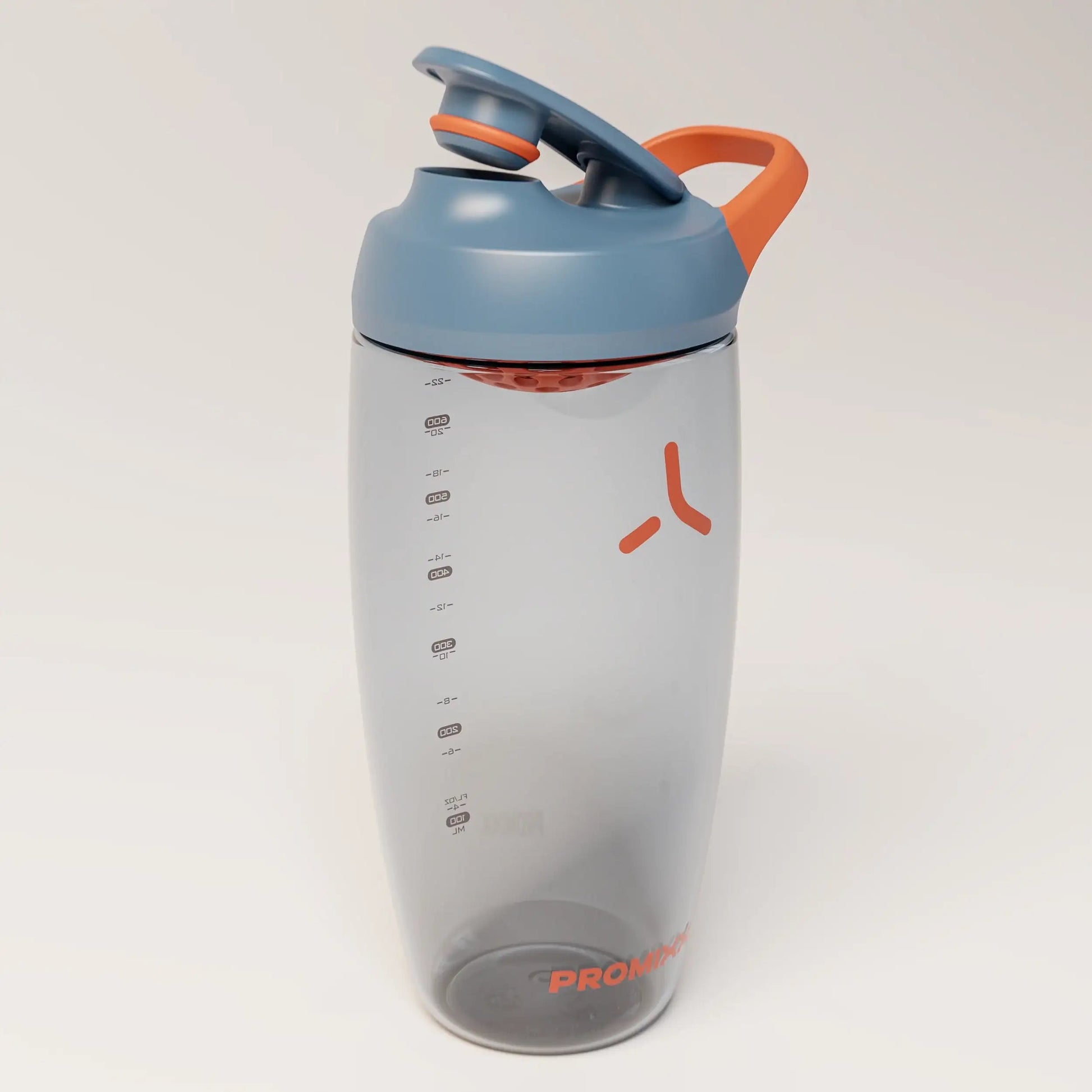 ecozen-performance-shaker-bottle-e3 SHKR_24700_P-S1.1_midnightBlue_burntOrange_2_3_highLeft_edit.png