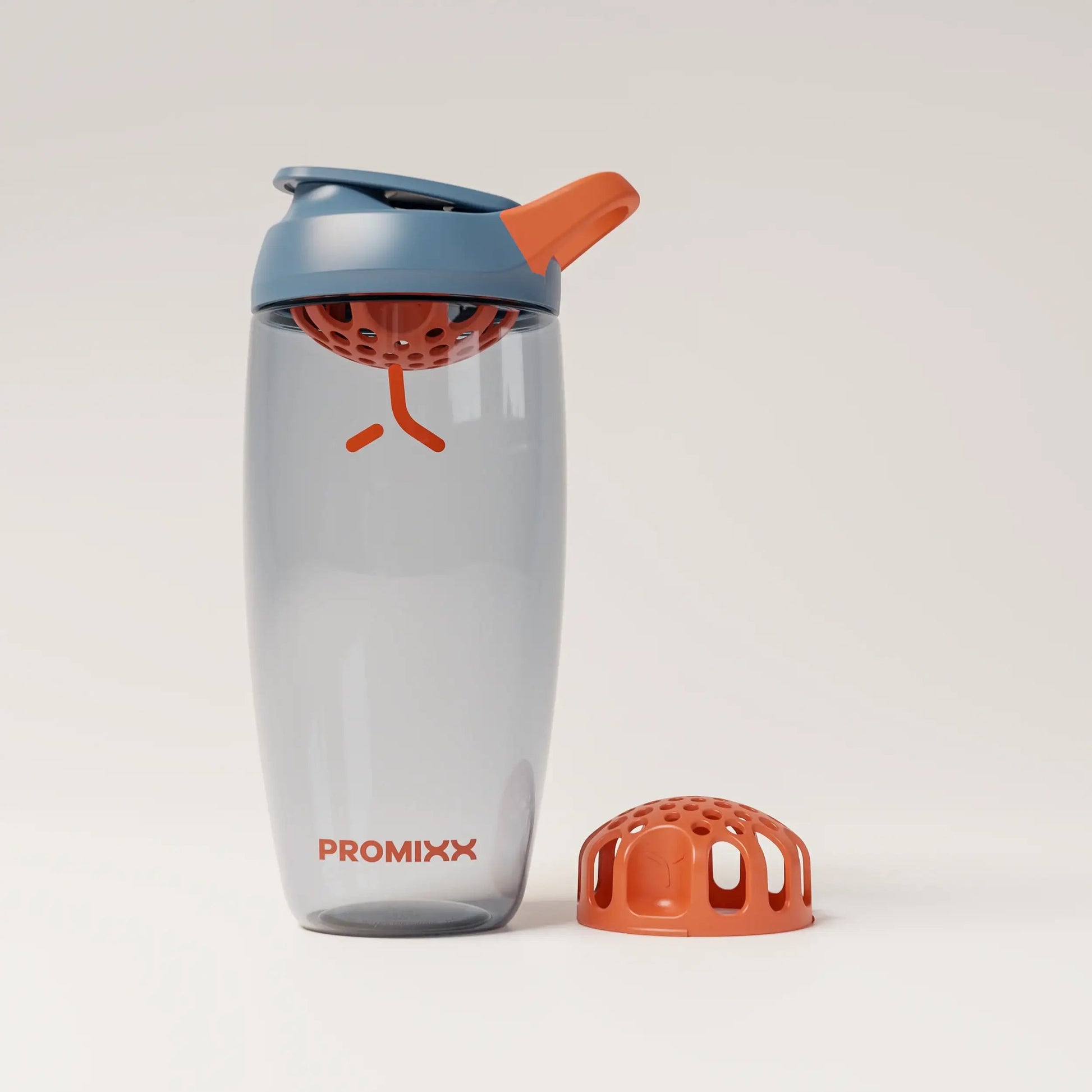 ecozen-performance-shaker-bottle-e3 SHKR_24700_P-S1_heroAgitatorFloor_midnightBlue_burntOrange_1_1_hero_edit_f37f5a2f-8cd4-4264-9ff5-4468aea63a90.png
